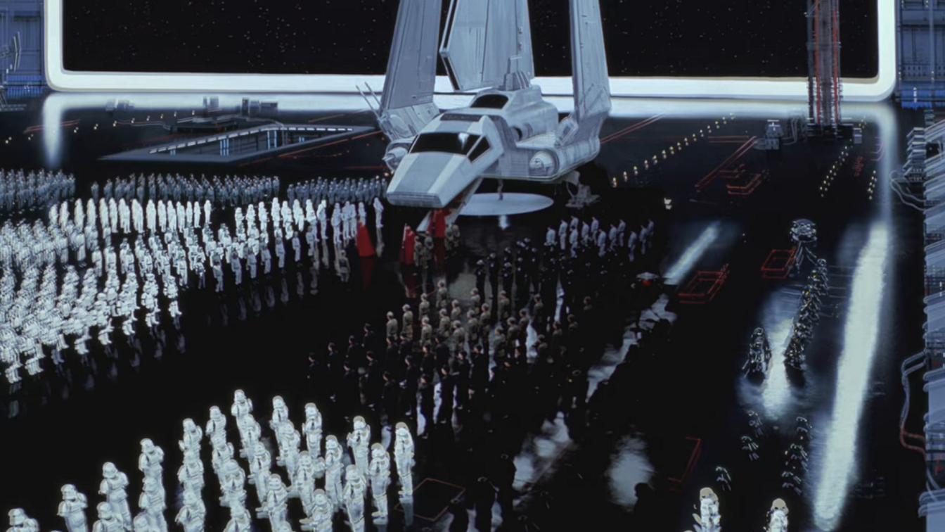 Cena de Star Wars exibindo diversos personagens com fantasias brancas organizados em fila em um espaço fechado. Eles estão ao redor de uma nave branca, de onde saem personagens vestindo capas vermelhas.