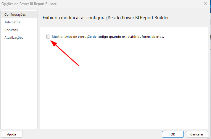 A janela de opções do Power BI Report Builder mostra o menu à esquerda com a opção "Configurações" selecionada. No painel principal, há uma opção intitulada "Mostrar aviso de execução de código quando os relatórios forem abertos", que possui uma caixa de seleção desmarcada ao lado.