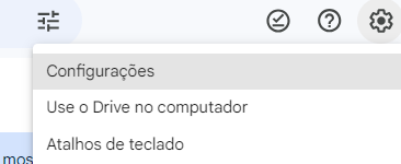 Captura de tela do menu suspenso. Está destaco em cinza a opção configurações. Abaixo também há opções como Use o drive no computador e atalhos no teclado