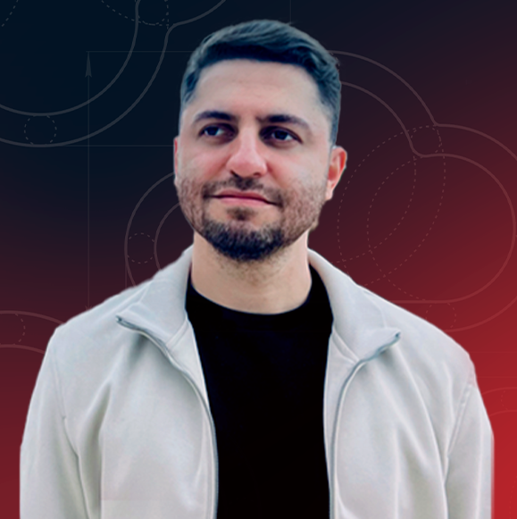 Imagem de Guilherme Lima, Tech Educator na Alura. Guilhereme está com uma camiseta preta e jaqueta cinza e o fundo é um gradiente vermelho.