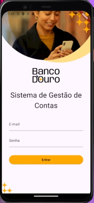 Tela de simulação de um smartphone exibindo uma aplicação de gestão de contas do Banco D'ouro com campos para e-mail e senha e um botão "Entrar". No topo, há uma imagem de uma mulher sorridente vestindo um casaco preto e uma blusa amarela manuseando um celular. A interface da aplicação tem um fundo amarelado com estrelas decorativas e a marca do Banco Douro em destaque.