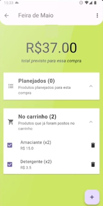 Tela de aplicativo de lista de compras, de fundo verde-claro, mostrando a seção 'Feira de Maio', indicada na caixa superior da tela, com valor total previsto de R$37,00, indicado em algarismos grandes no topo da tela. Abaixo, a tela é dividida em categorias, separadas em caixas brancas: 'Planejados (0)', sem itens listados, e 'No carrinho (2)', com dois itens listados, o 'Amaciante (x2)' pelo valor de R$15,00 e 'Detergente (x2)' pelo valor de R$3,50. Existem ícones de lixeira ao lado dos produtos listados e um botão de adição (+) na parte inferior direita da tela.