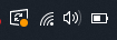 Captura de pantalla de la barra de herramientas de Windows, y sobre el icono del sistema hay un punto naranja que indica que debe actualizarse